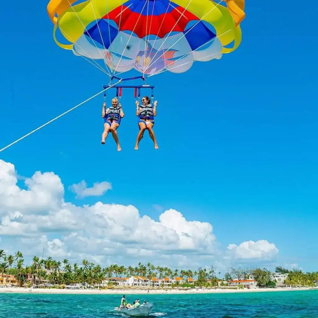 Parasailing adventure in Punta Cana with ocean views, offered by JMS Experiences Dominican Republic.